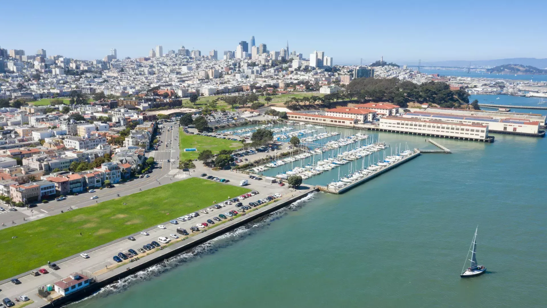 Aerial of Fort Mason with the San Francisco skyline in the distance.